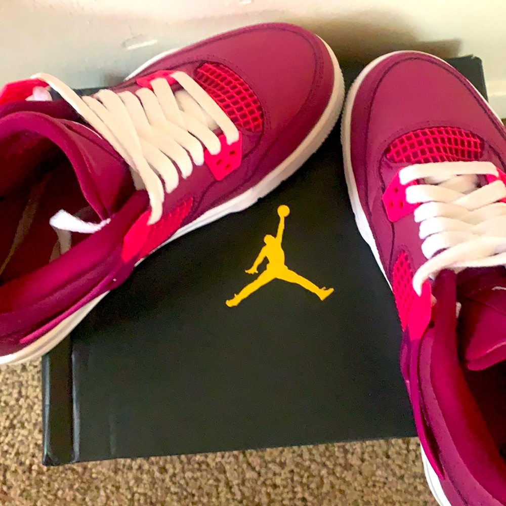 Purple and pink Air Jordan shoes